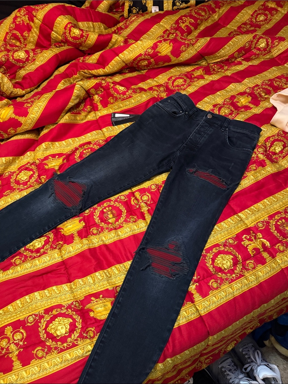 AMIRI Black Distressed Skinny Jeans with Red Underlay